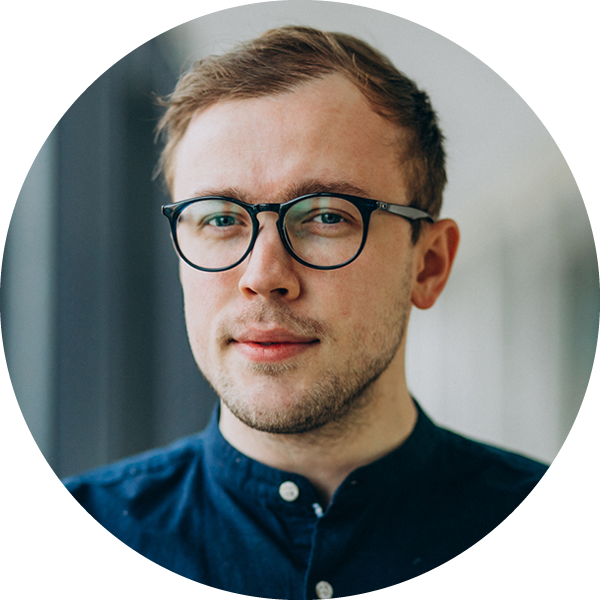 Young man in spectacles testimonial head shot. Five star reviews.