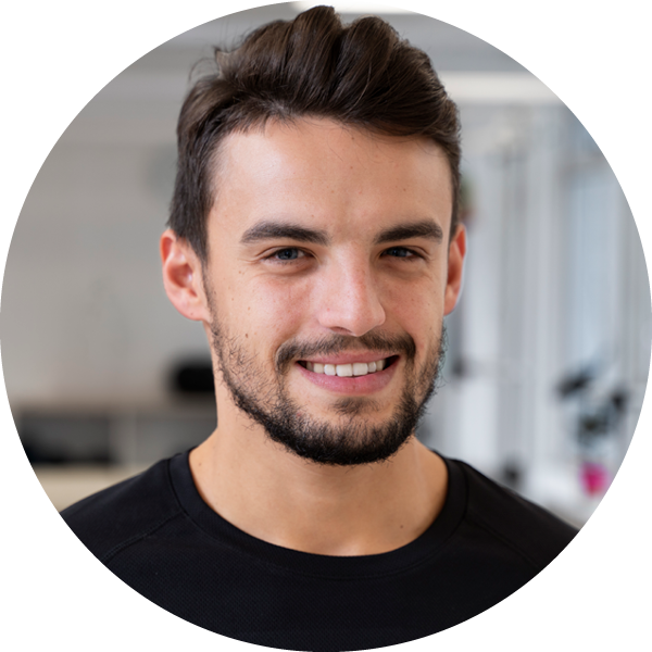 Young man with brown hair testimonial head shot.