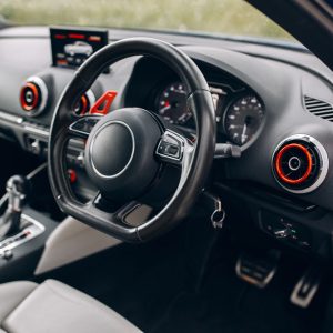View of steering wheel and dashboard on trendy modern automatic car